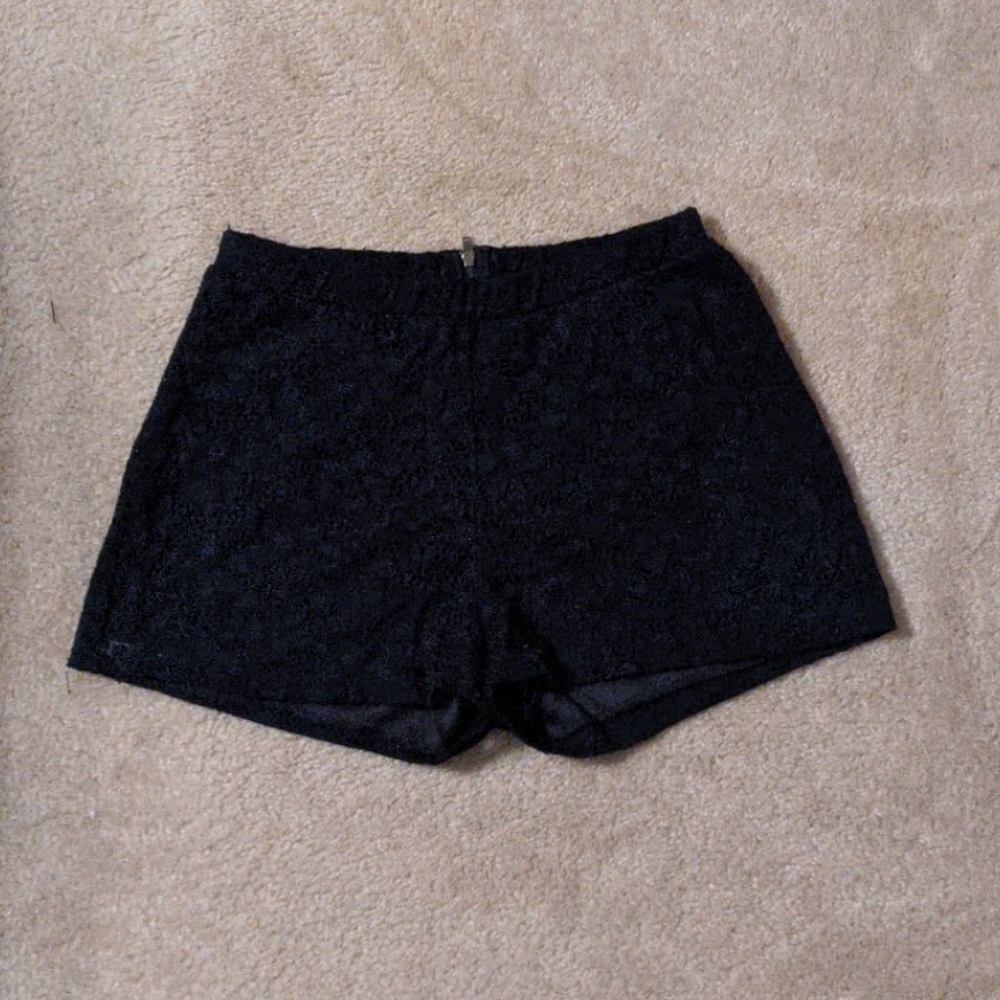 Zip up black lace shorts
